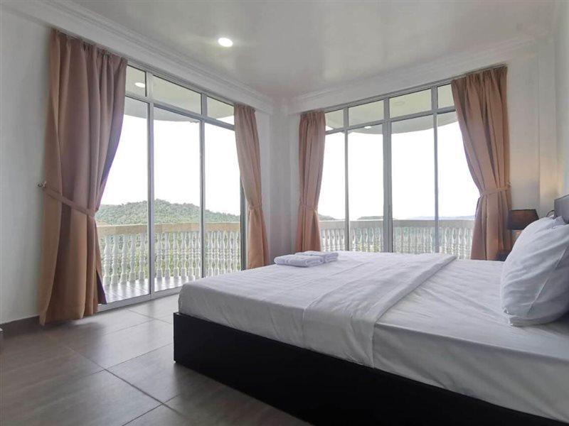 Oyo 90043 Jasni Rijan Resort Ranau Esterno foto
